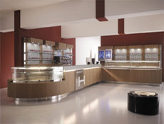 Front counter cladding in Hi-Bar joined with Classic deli/pastry displays. Back wall shelving