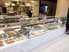 Custom Italia 1 & 2: deli / pastry with single pane glass, stone top and front panel, remote